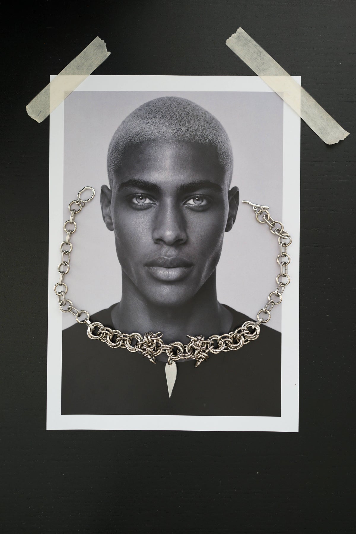 SARAH BOUNAB “Blade Heart” necklace in stainless steel with a mirror-polished aluminum tip pendant, handmade in Switzerland.