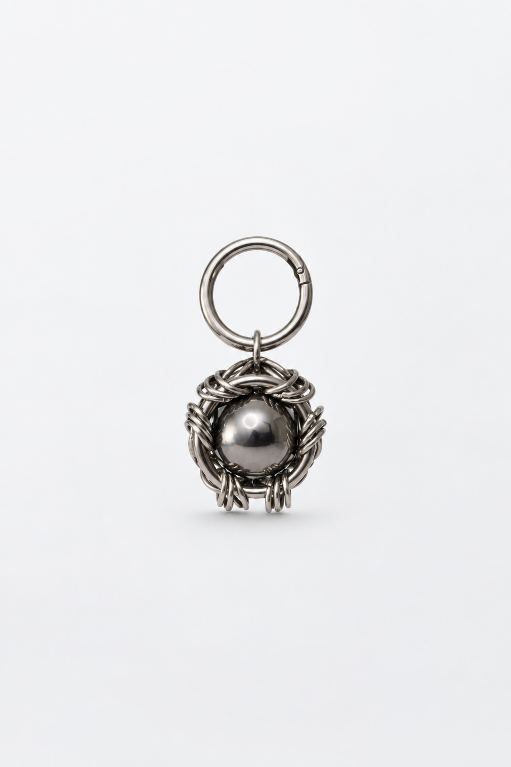 SARAH BOUNAB Mirror Core Keychain with mirrored sphere and stainless steel braiding, handmade in Switzerland.