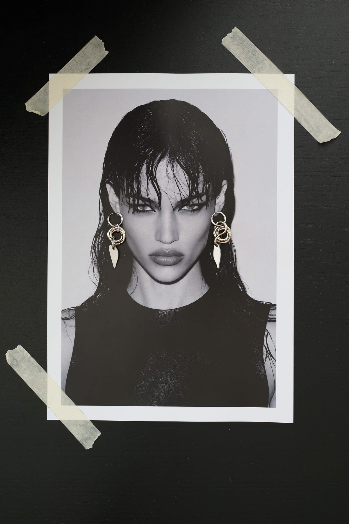 SARAH BOUNAB Orbit Petal Earrings featuring stainless steel rings with an aluminum petal pendant.