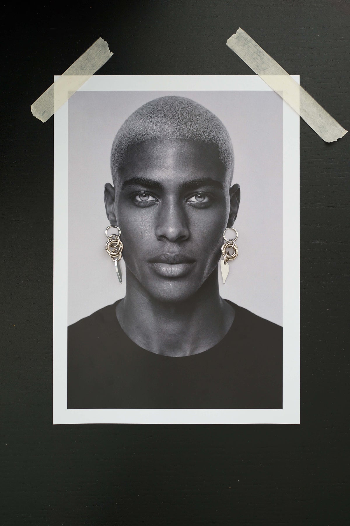 SARAH BOUNAB Orbit Petal Earrings featuring stainless steel rings with an aluminum petal pendant.