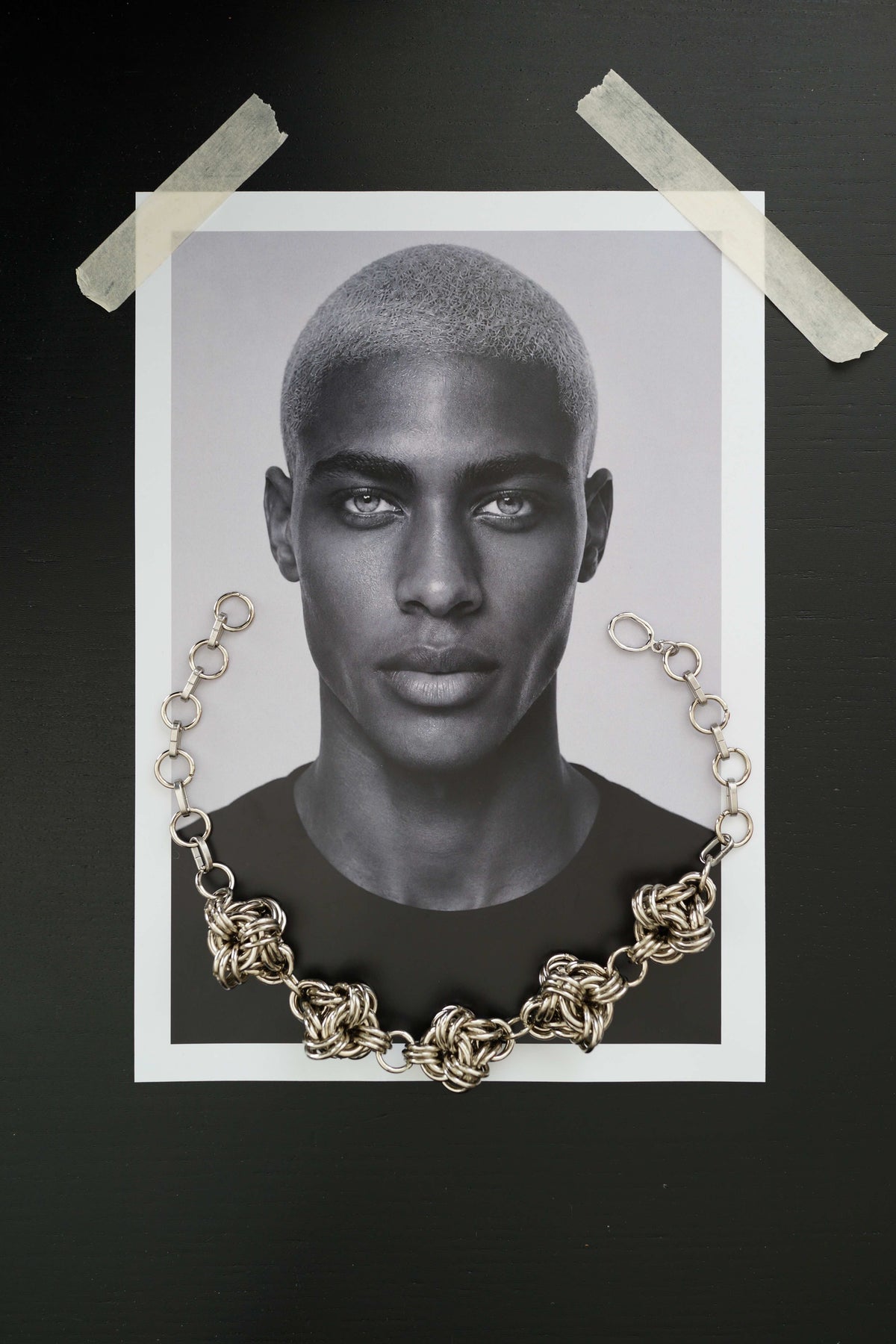 SARAH BOUNAB Orbital Knot Necklace, featuring five stainless steel ring knots, handcrafted in Switzerland.