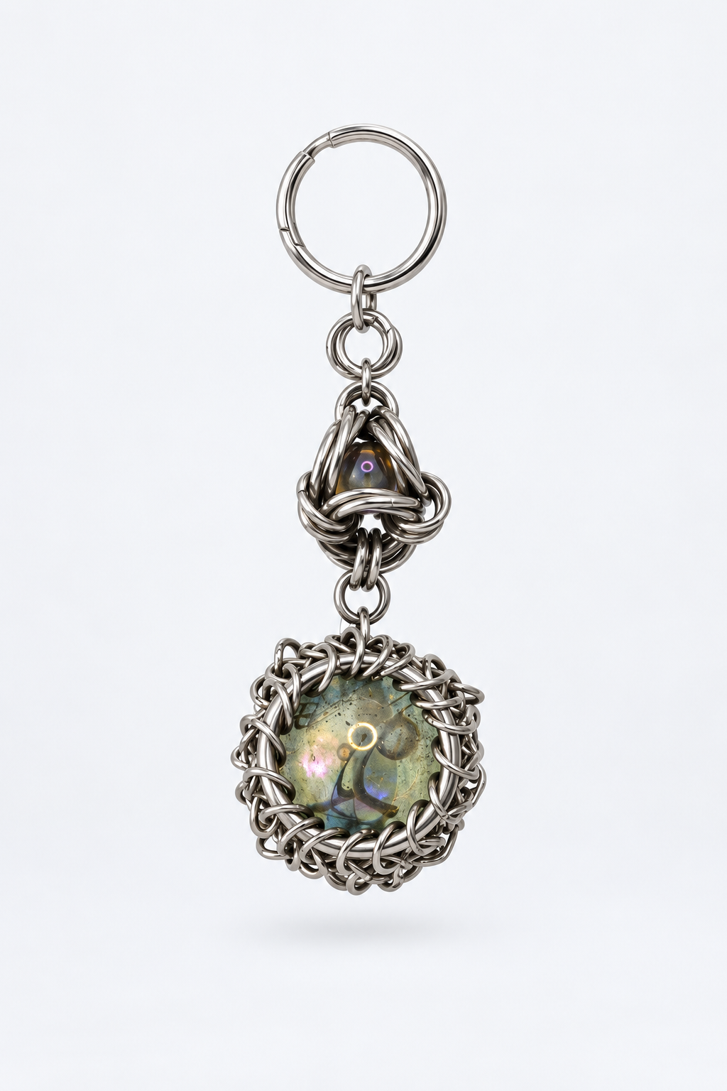 SARAH BOUNAB “Twin Relic” stainless steel keychain with two iridescent beads, hand-braided in Switzerland.